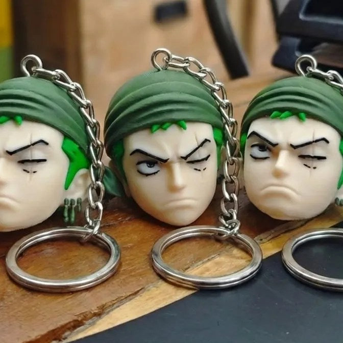 Porte-clés One Piece 🏴‍☠️ Têtes 3D (Luffy, Zoro, Sanji…)